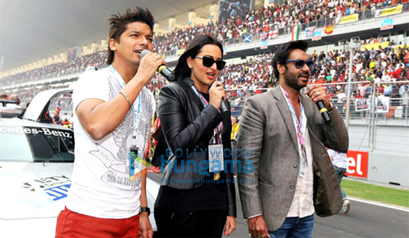 ajay sonakshi shaan sing national anthem at formula one indian grand prix 2