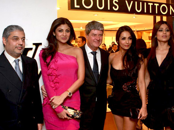 Actress Lara Dutta (R) with Yves Carcelle (L), Chairman and CEO