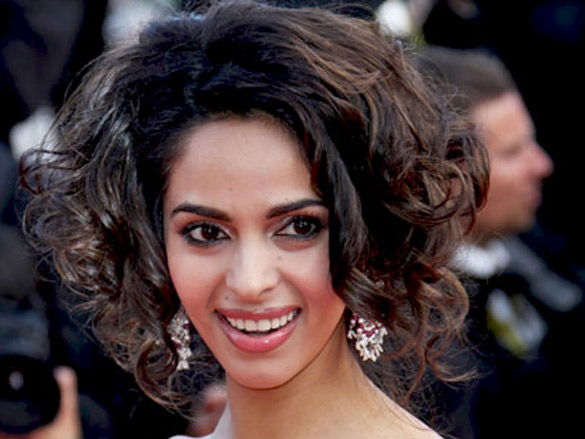 mallika sherawat attends the premiere of wall street money never sleeps held at the palais des festivals during the 63rd annual international cannes film festival 4