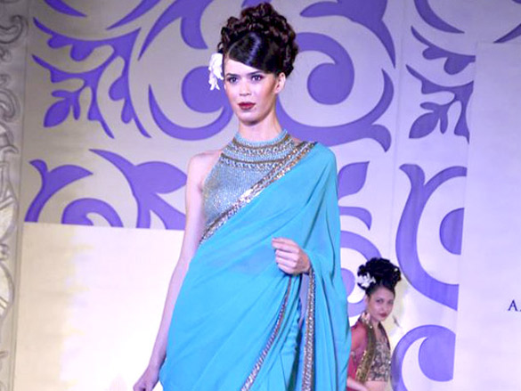 neetu chandra walks for ashima leena at aamby valley city india bridal week 2010 11