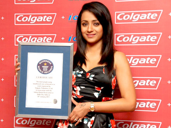 trisha poses with guinness world records certificate for colgate and ida 3