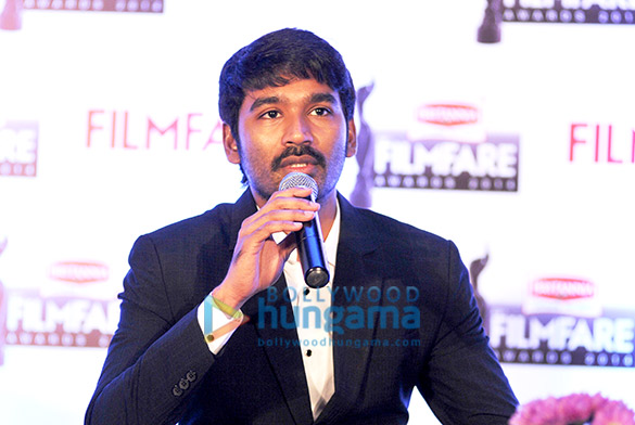 dhanush at the 62nd britannia filmfare south awards special award issue launch at the leela palace 9