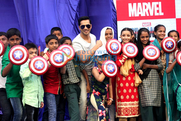 varun dhawan launches the captain america action figurines 5