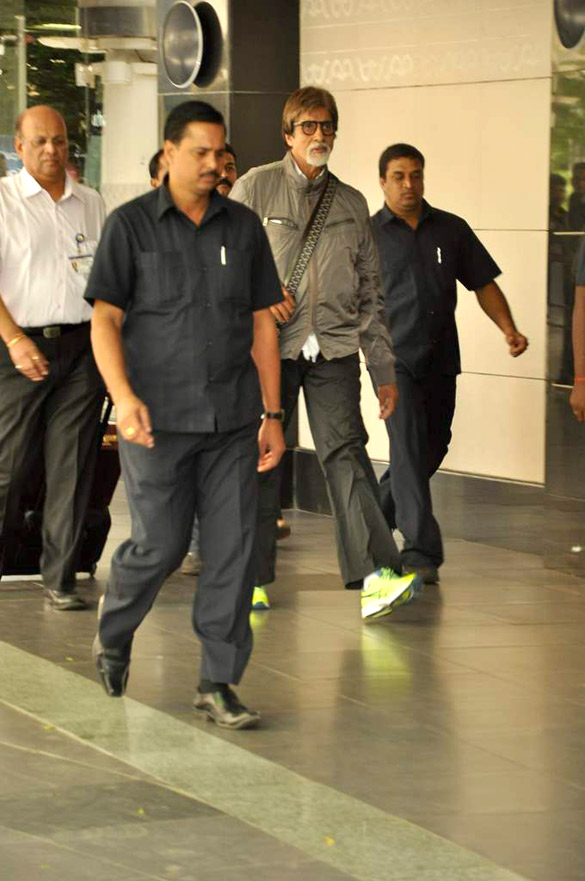 big b snapped in green florescent sports shoes 3