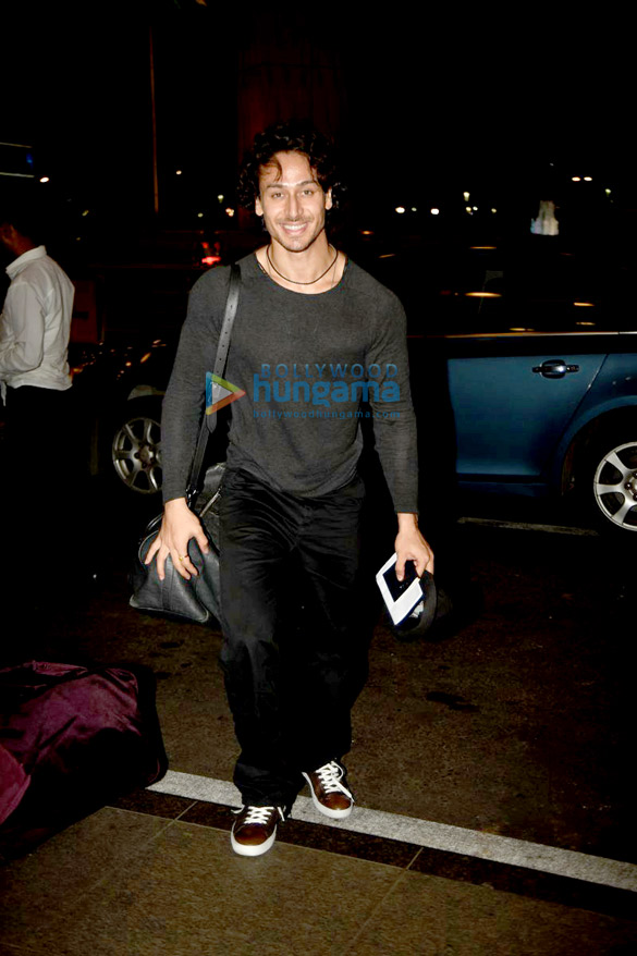 Tiger Shroff & Disha Patani snapped enroute to Europe for song shoot Tiger Shroff & Disha Patani snapped enroute to Europe for song shoot