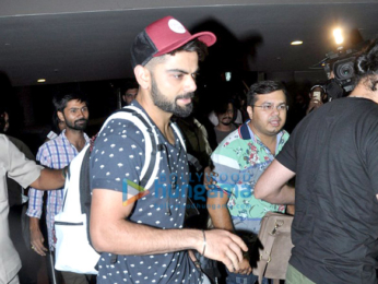 Virat Kohli snapped at the airport arriving from Delhi