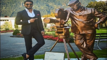 Ranveer Singh poses alongside Yash Chopra’s statute in Switzerland