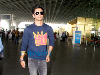 Amy Jackson & Sushant Singh Rajput snapped at the airport
