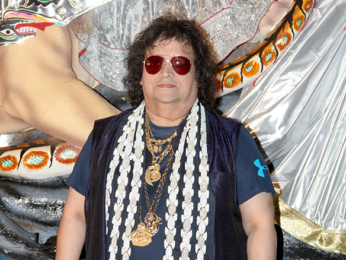 Bappi Lahiri & Bappa Lahiri at Durga Puja celebrations at the North Bombay Sarbojanin Durga Puja Samiti in Mumbai