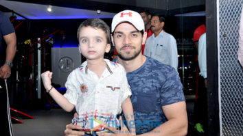 Sooraj Pancholi snapped with a kid fan at Gym launch