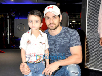 Sooraj Pancholi snapped with a kid fan at Gym launch