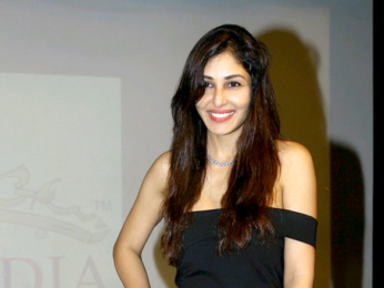 Pooja Chopra walks the ramp at a college's fashion fest