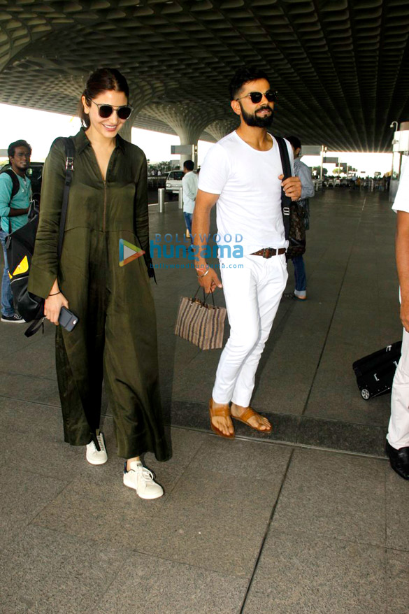 virat kohli anushka and many more snapped at airport 7