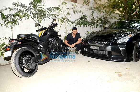 John Abraham snapped with his favorite bike and car