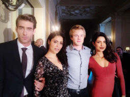 Check out: Priyanka Chopra looks ravishing in red with her cast on sets of the Quantico