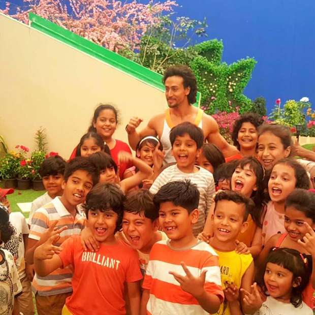 Tiger Shroff having a blast with children while shooting for Sony YAY!