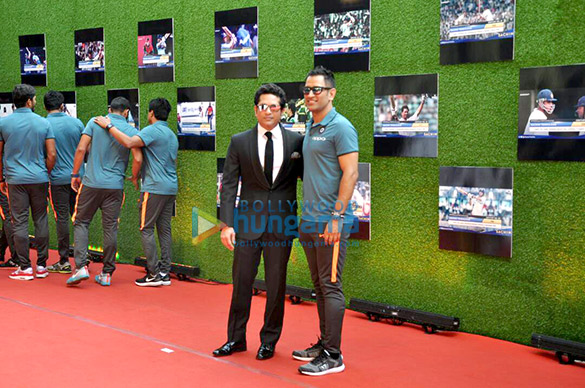 anushka sharma and cricketer virat kohli pose with sachin tendulkar at the premiere of sachin a billion dreams 3