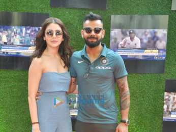 Anushka Sharma and cricketer Virat Kohli pose with Sachin Tendulkar at the premiere of Sachin A Billion Dreams