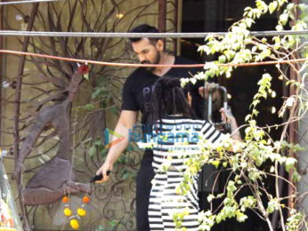 John Abraham snapped taking a rickshaw ride after a salon session at Mad O Wot