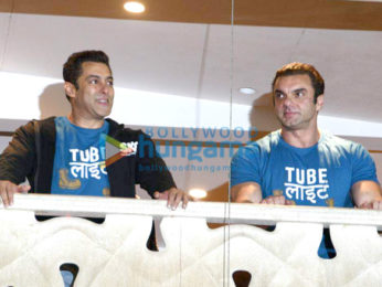 Salman Khan and Sohail Khan wave to their fans at the trailer launch of 'Tubelight'
