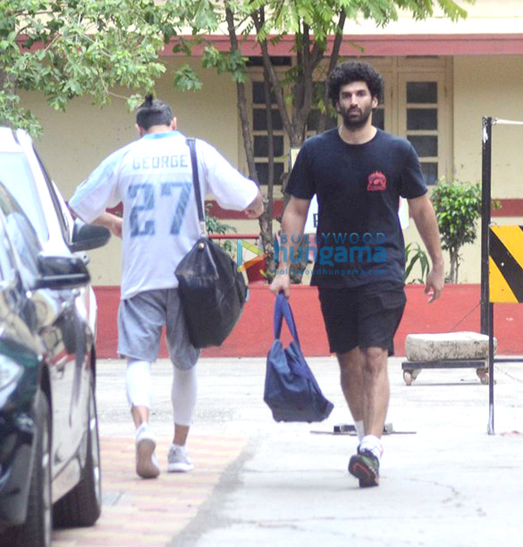 Aditya Roy Kapoor and Rhea Chakraborty snapped post their gym session in Bandra Aditya Roy Kapoor and Rhea Chakraborty snapped post their gym session in Bandra