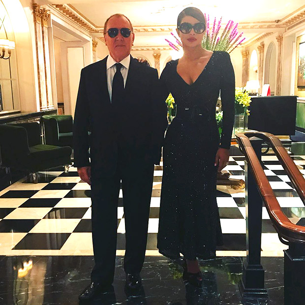 Check out Priyanka Chopra stuns in sequin black dress and strikes a pose with American designer Michael Kors1