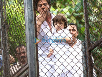 Shah Rukh Khan and his AbRam Khan snapped at their house Mannat on Eid today