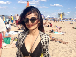 WOW! Mouni Roy looks hot chilling at the beach in this black bikini top