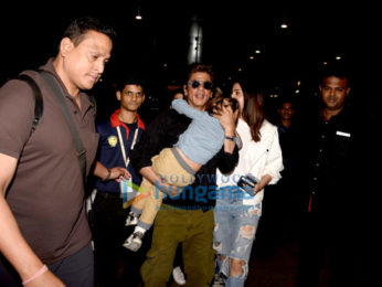 Shah Rukh Khan and Anushka Sharma arrive back from Dubai JHMS promotions