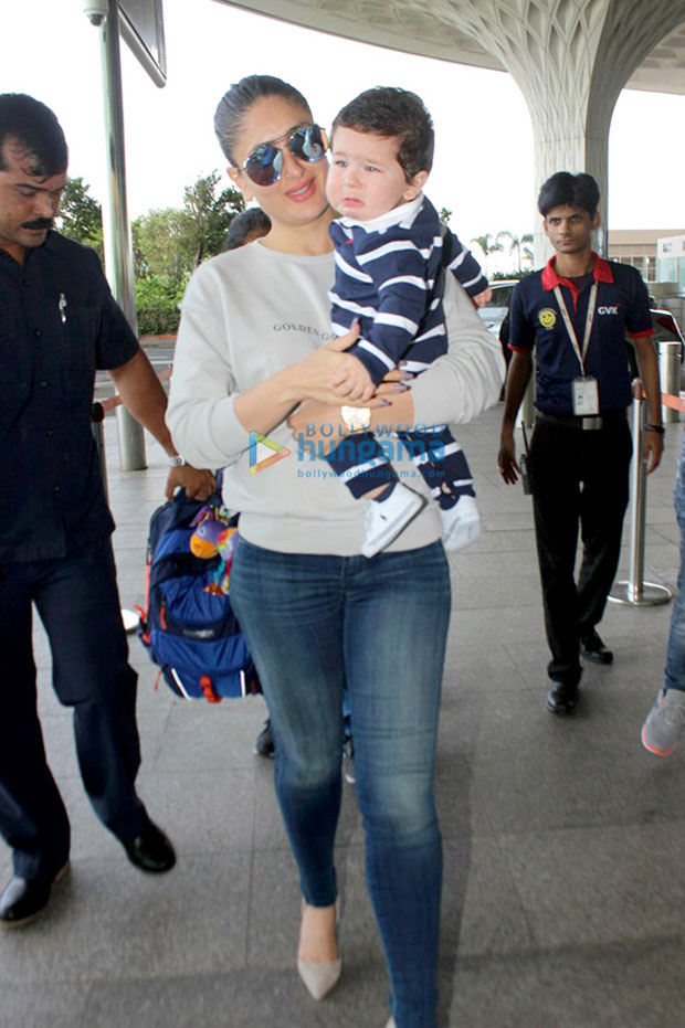 Check-out-Kareena-Kapoor-Khan-tries-to-console-a-crying-baby-Taimur-while-leaving-for-Delhi-for-Veere-Di-Wedding