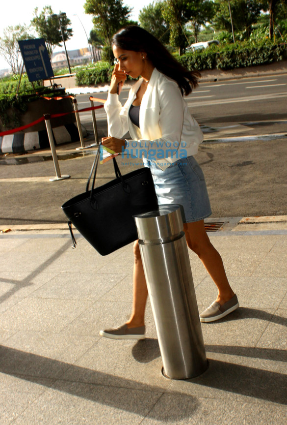 John Abraham & Priya Runchal snapped at the airport