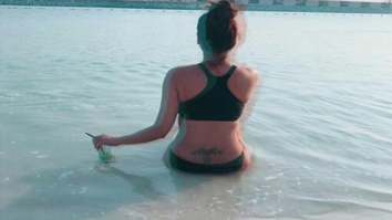 HOT! Daisy Shah flaunts her lower back tattoo in this sizzling image