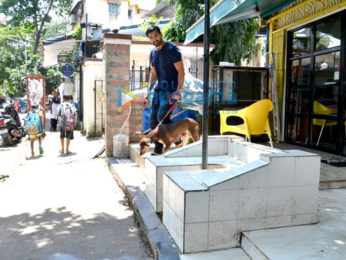 John Abraham snapped with his dog post visiting a Veterinary clinic in Bandra