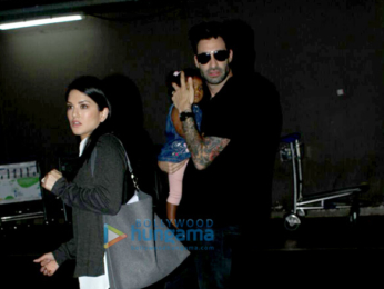 Sunny Leone, Daniel Weber snapped with kid Nisha Kaur Weber at the airport