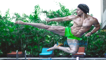 WHOA! Tiger Shroff shows off his ripped body while doing a flying kick in a swimming pool for Baaghi 2