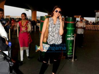 Kriti Sanon, Kajal Agarwal and Karan Johar snapped at the airport