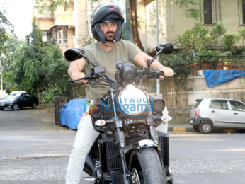 John Abraham spotted with his sports car and bike