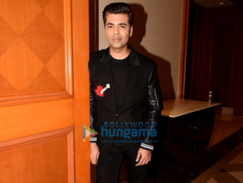Karan Johar snapped at press meet for Ishq FM