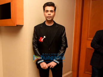 Karan Johar snapped at press meet for Ishq FM