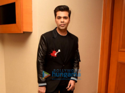 Karan Johar snapped at press meet for Ishq FM