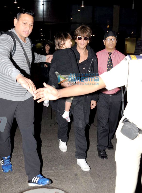 Shah Rukh Khan & AbRam snapped arriving from London Shah Rukh Khan & AbRam snapped arriving from London