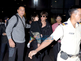 Shah Rukh Khan & AbRam snapped arriving from London