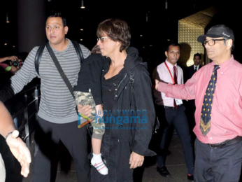 Shah Rukh Khan & AbRam snapped arriving from London