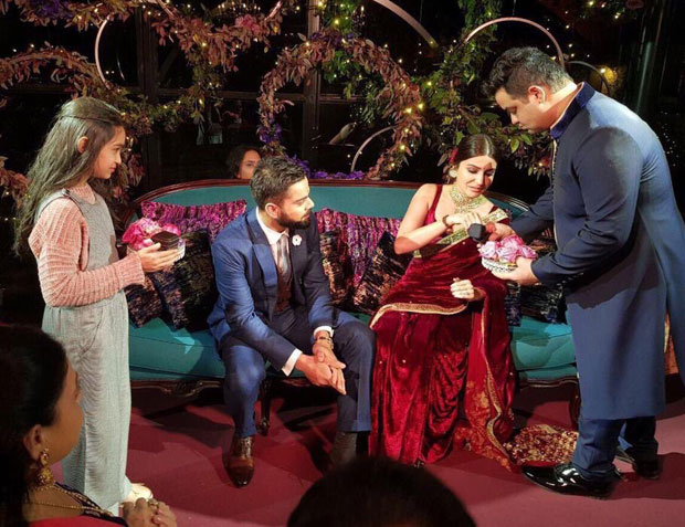 Virat Kohli gives a sweet kiss to Anushka Sharma after their engagement ceremony-03