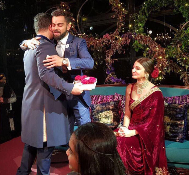 Virat Kohli gives a sweet kiss to Anushka Sharma after their engagement ceremony-04