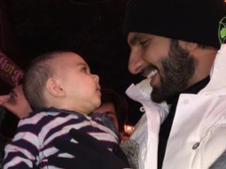 WATCH: Ranveer Singh cuddles a cute little baby in London and it’s absolutely adorable