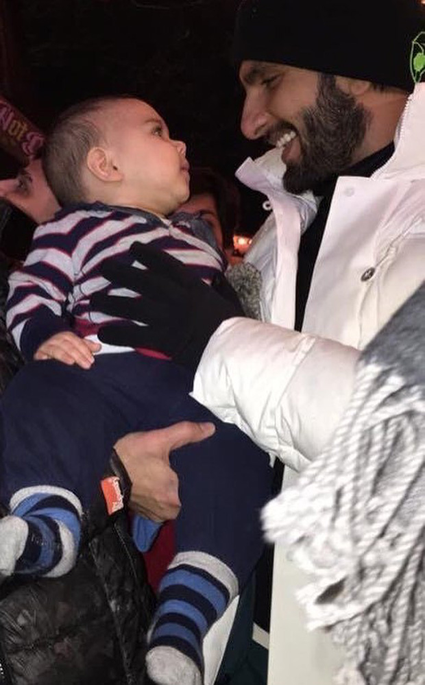 WATCH Ranveer Singh cuddles a cute little baby in London and it's absolutely adorable