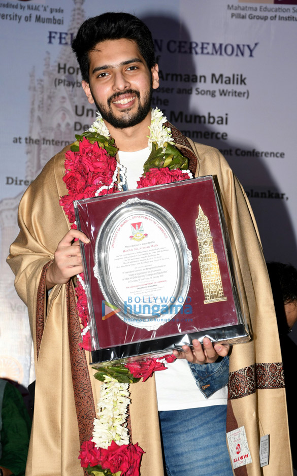 armaan malik felicitated at by the university of mumbai department of commerce at the international commerce and management conference 2