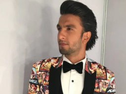 Lights, Camera, Action – Ranveer Singh wears some good old filmy nostalgia on his fashionable sleeve for the 63rd Jio Filmfare Awards 2018!
