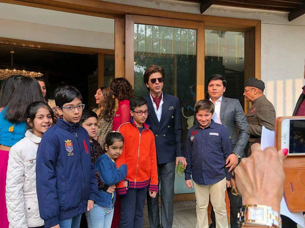 Shah Rukh Khan snapped at a family wedding along with family